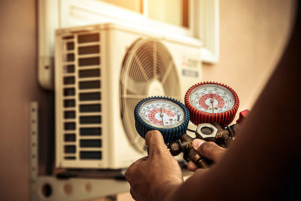 Professional Heat Pump Repair technician working in East Nassau, NY